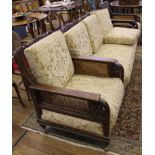 A Victorian three-piece suite, foliate carving to upper top rail, cane sides and backs, cream and