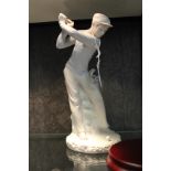 A Lladro The Golfer, with box