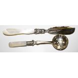 A silver butter knife with mother of pearl handle, Sheffield 1859, and a sifter spoon EPNS with
