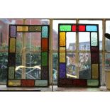 A pair of stained glass panels