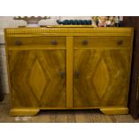 A dining room sideboard with lidded cutlery section, 92H x 122W x 44cmD