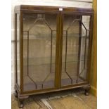 An Edwardian display cabinet, twin glazed doors on cabriole legs  112H x 123W x 30cmD