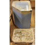 A Lloyd Loom blue and gold lustre laundry basket and an upholstered footstool