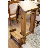 A pine lectern and kneeler