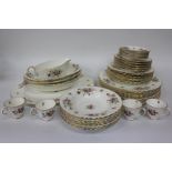 A MINTEN MARLOW PATTERN PART DINNER SERVICE consisting of an oval meat plate, 8 dinner plates, 8