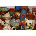 A COLLECTION OF DEVONSHIRE EARTHERNWARE POTTERY to include a pair of Allervale green glazed vases,