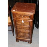 A CONTINENTAL WALNUT CUPBOARD with inset red marble top over single drawer, cupboard door with