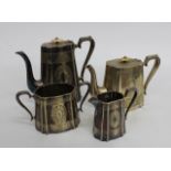 A LARGE LATE 19TH CENTURY EPNS FOUR PIECE TEA AND COFFE SET the tea and coffee pot with ivorine