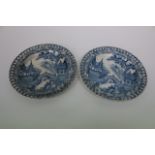 A PAIR OF EARLY 19TH CENTURY BLUE AND WHITE PEARLWARE PLATES, chinoiserie scenes and pierced