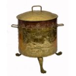 AN OLD BRASS AND COPPER CYLINDRICAL LOG BUCKET AND COVER