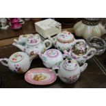 A COLLECTION OF REPRODUCTION 18TH CENTURY STYLE PORCELAIN TEAPOTS together with a small porcelain