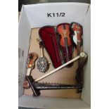 A MINIATURE MODEL OF A VIOLIN within fitted case together with a miniature guitar, two miniature