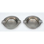 A PAIR OF TIFFANY & CO STERLING SILVER ASHTRAYS model No. 21883, each 10cm wide