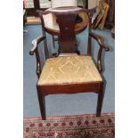 A CHIPPENDALE TYPE MAHOGANY OPEN ARM CHAIR WITH BROAD VASE SPLAT BACK, shaped arms, upholstered drop