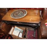 A 19TH CENTURY GOTHIC CARVED OAK HALL TABLE with lion mask corners, standing on carved and turned