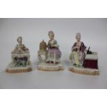 A GROUP OF THREE MEISEN PORCELAIN GROUPS OF THREE LADIES, one sitting at a dressing table, another