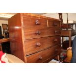 A 19TH CENTURY MAHOGANY CADDY TOP CHEST of two short and three long drawers with turned knob handles