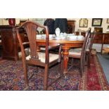 A SET OF SIX LATE 19TH/EARLY 20TH CENTURY MAHOGANY DINING CHAIRS with pierced splat backs, drop-in