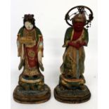 A CHINESE CARVED AND GILTWOOD ATTENDANT FIGURE with offering and another carved figure of a