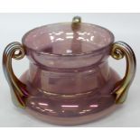 AN EARLY 20TH CENTURY PINK LUSTRE LURTZ TYPE GLASS VASE with three scrolling handles and polished