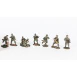 A BRITAINS CAST METAL SOLDIERS GERMAN WWII MACHINE GUN UNIT together with further German soldiers,