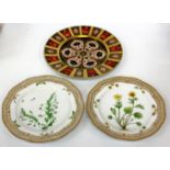 A PAIR OF ROYAL COPENHAGEN 'FLORA DANICA' CABINET PLATES hand painted with flowers within a