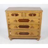 A VICTORIAN PAINTED PINE CHEST of two short and three long drawers with turned knob handles and