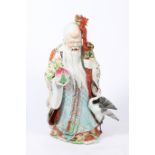 A LARGE CHINESE PORCELAIN FIGURE of an elderly gentleman 89cm in height