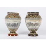 A PAIR OF VICTORIAN DOULTON STONEWARE VASES each with scratched decoration of sheep by Hannah