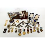 A LARGE QUANTITY OF MASONIC SILVER and other badges and medals relating to Erasmus Wilson Lodge,