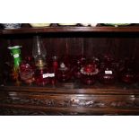 A COLLECTION OF VARIOUS CRANBERRY GLASSES to include beakers, vases etc.