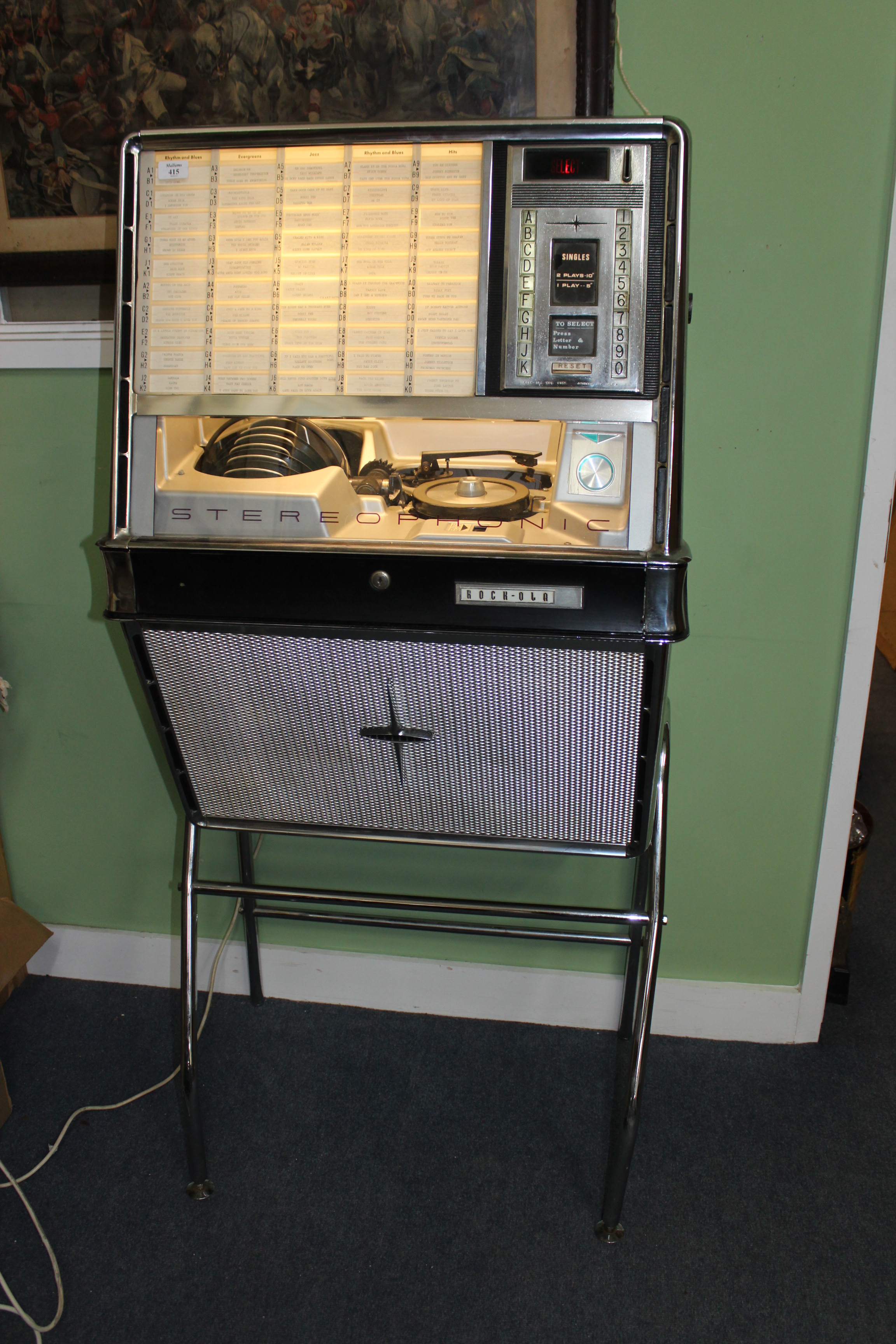 A ROCK-OLA 430 STEREOPHONIC JUKE BOX holding fifty singles and standing on original chromium - Image 2 of 2