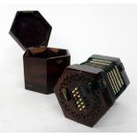 AN ANTIQUE, POSSIBLY 19TH CENTURY ROSEWOOD 48 BUTTON CONCERTINA with decoratively pierced end