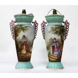 A PAIR OF CONTINENTAL TURQUOISE GROUND PORCELAIN VASES with decorative painted panels of two women