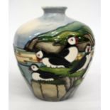 A MOORCROFT PUFFIN PATTERN VASE signed Kerri and dated 1997, 18cm high