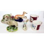 A SMALL GROUP OF POTTERY and porcelain to include a Staffordshire hound pen stand, a 19th Century