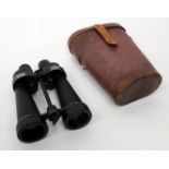 A PAIR OF WWII NAVAL 7X BINOCULARS by Barr & Stroud, 24 cm long, with a leather case