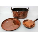 A 19TH CENTURY COPPER FOOTBATH with embossed scrolling floral decoration and two loop handles,