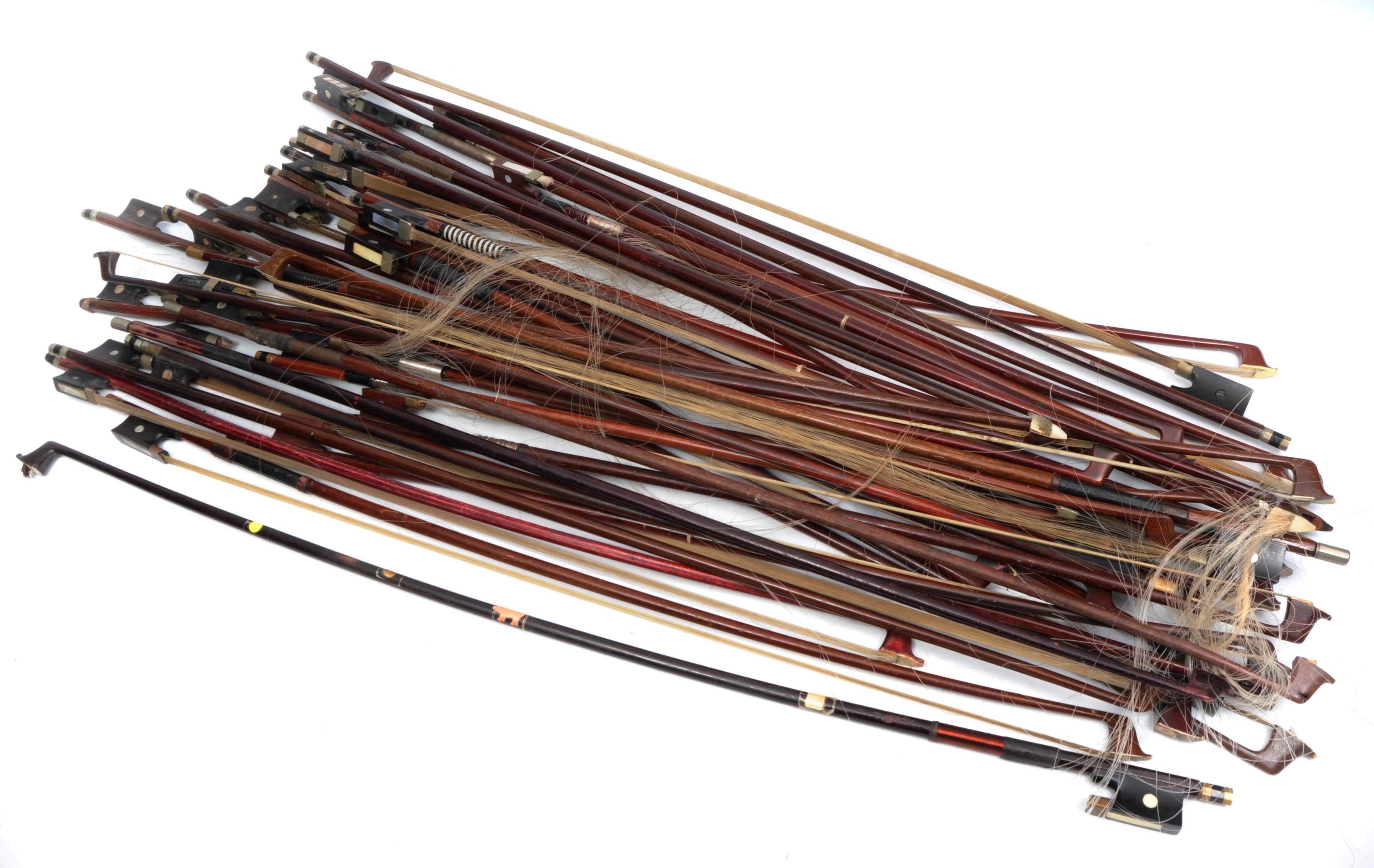 A LARGE COLLECTION OF ANTIQUE AND LATER VIOLIN BOWS