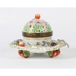 AN 18TH CENTURY MEISSEN PORCELAIN SWEETMEAT BASKET and integral stand, the pierced lid to the