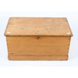 AN OLD PINE BLANKET BOX with iron carrying handles to the side, 85.5cm wide