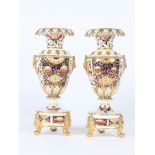 A PAIR OF BLOOR DERBY VASES of classical form, decorated in the Imari pallet and with bearded