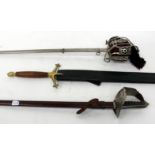 A 20TH CENTURY REPRODUCTION SCOTTISH OFFICERS SWORD with basket hilt, overall 100cm in length