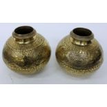 A PAIR OF INDIAN BRASS WATER CARRYING POTS with all over embossed decoration, portraits and