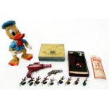 A SMALL GROUP OF VARIOUS VINTAGE TOYS consisting of a 'Dan Dare' pistol, a football game, lead