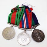 A GROUP OF 20TH CENTURY MILITARY MEDALS A 1939-45 Medal, the Defence Medal, an Arabian Peninsula