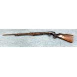 AN EARLY 20TH CENTURY BSA AIR RIFLE, number 3039, 110cm in length