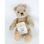 A 1950'S STEIFF CARAMEL ORIGINAL BEAR, 18cm in length