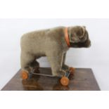 A STEIFF 'BEAR ON WHEELS' 1921, 2003 REPLICA, limited to 1500 pieces worldwide, number 00384, 56cm