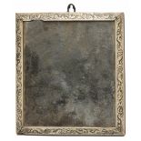 AN ANTIQUE ANGLO-INDIAN IVORY FRAMED MIRROR with black stained floral decoration, 23cm x 22cm